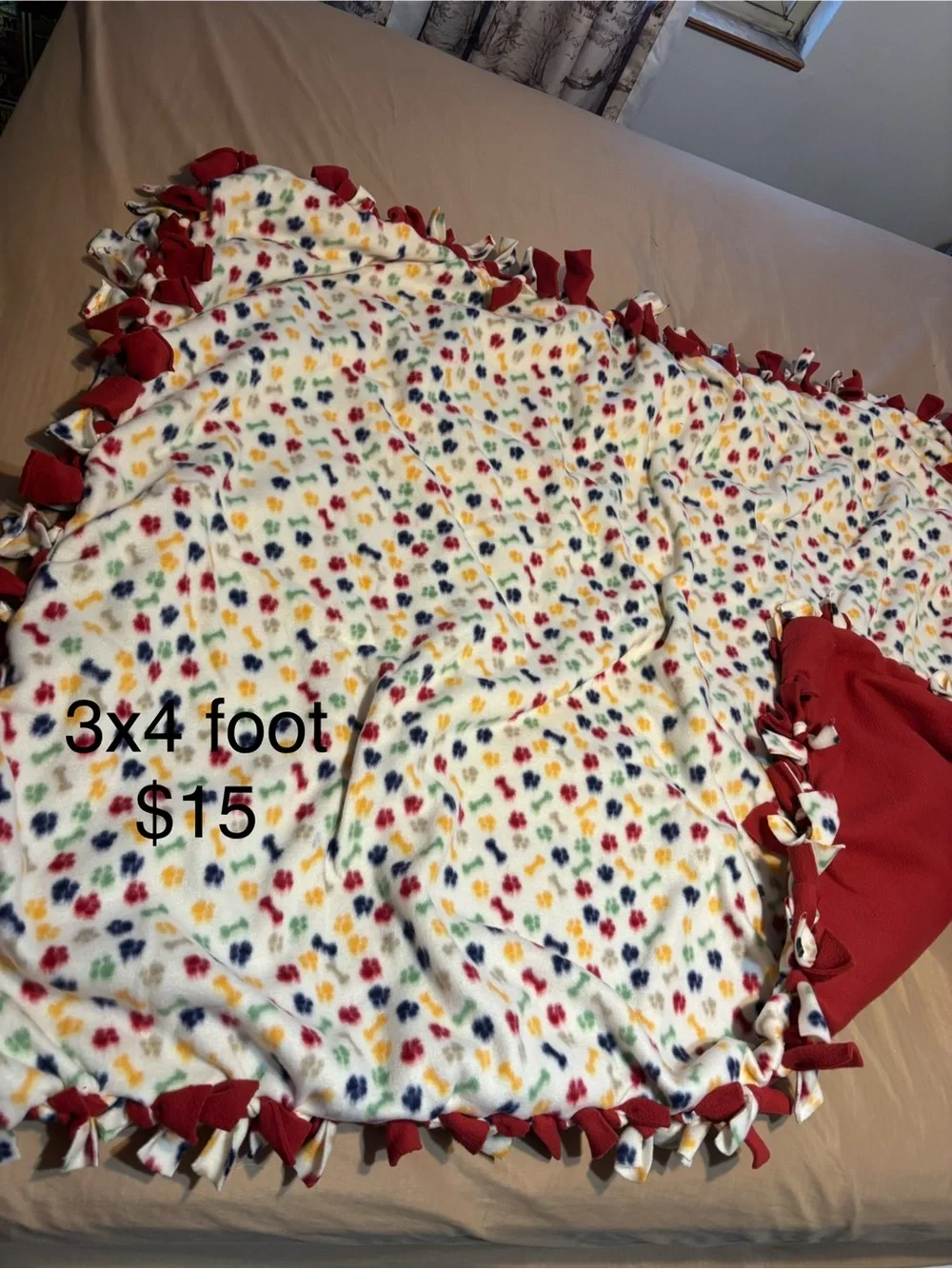 Cozy Kids Fleece Tie-Edge Blanket - White with Colorful Paw Prints and Red Trim